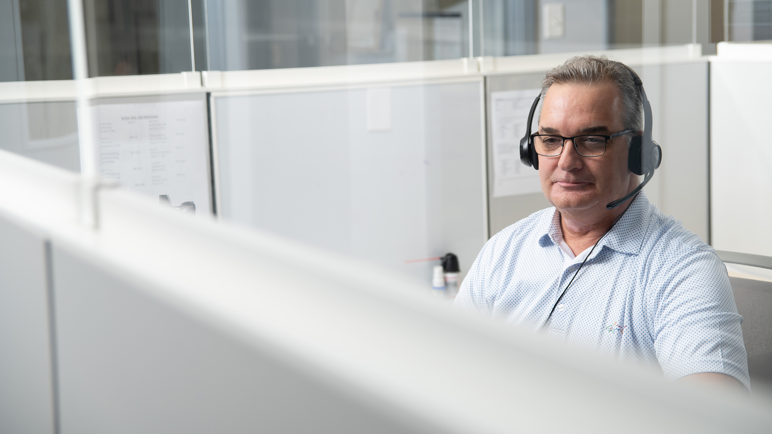 Spa technical support employee using a headset.